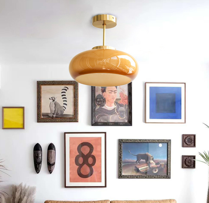 mustard yellow pendant light on living room ceiling