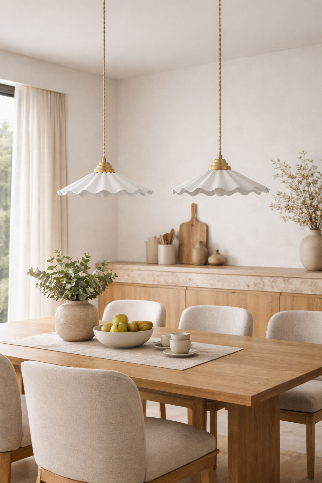 Wavy matt ceramic pendant lights hanging on dining table