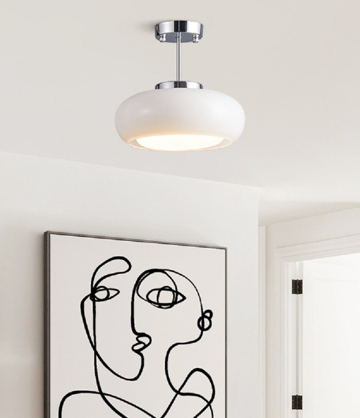 White pendant light hanging over bedroom ceiling modern design