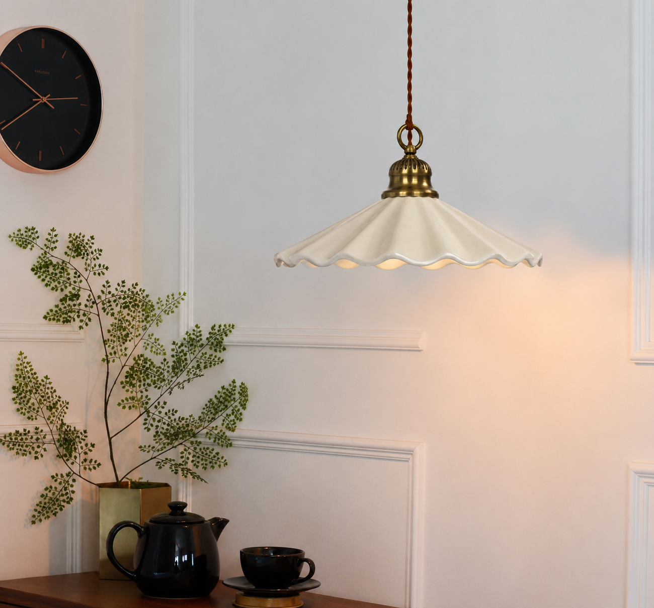 Industrial porcelain pendant light over coffee table living room