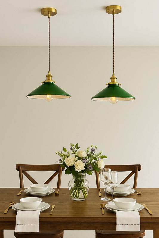 Vintage green glass pendant light with a wide retro shade and brass hardware.