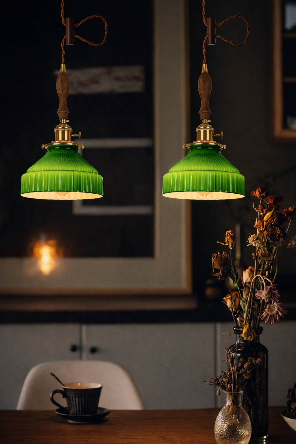 Vintage green ribbed glass pendant light with antique brass hardware and a retro silhouette