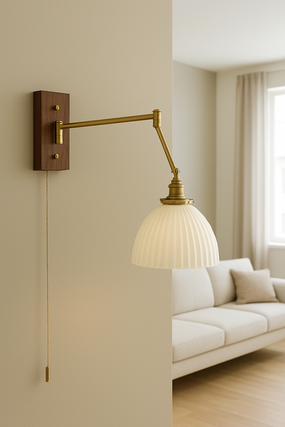  mid-century modern style wall light, perfect for bedside reading, blending the elegance of brass with earthy ceramic and wood elements.
