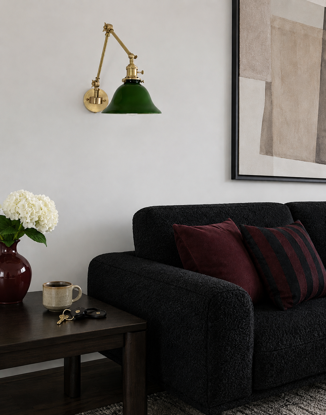 Vintage style brass wall sconce featuring a green glass banker lampshade and convenient pull chain switch