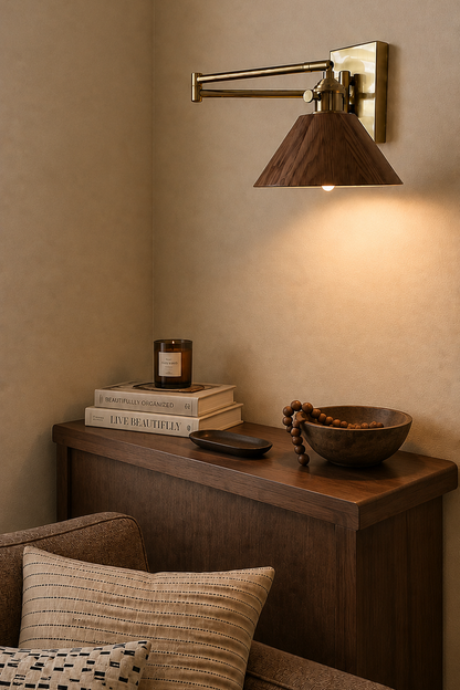 A brass wall sconce with a dark wood conical shade.