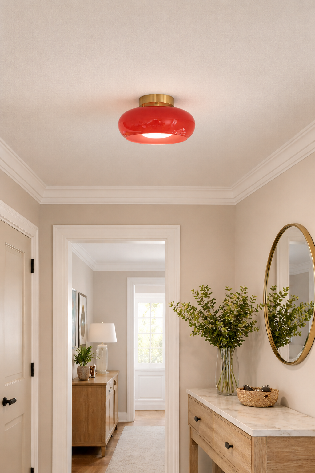 Antique brass and red glass flush mount ceiling light fixture installed at entryway – A classic round-shaped glass fixture with aged brass hardware.