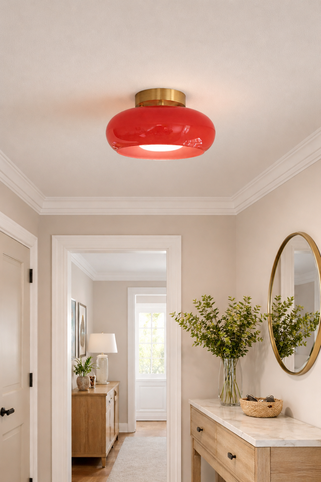 Antique brass and red glass flush mount ceiling light fixture installed at entryway – A classic round-shaped glass fixture with aged brass hardware.