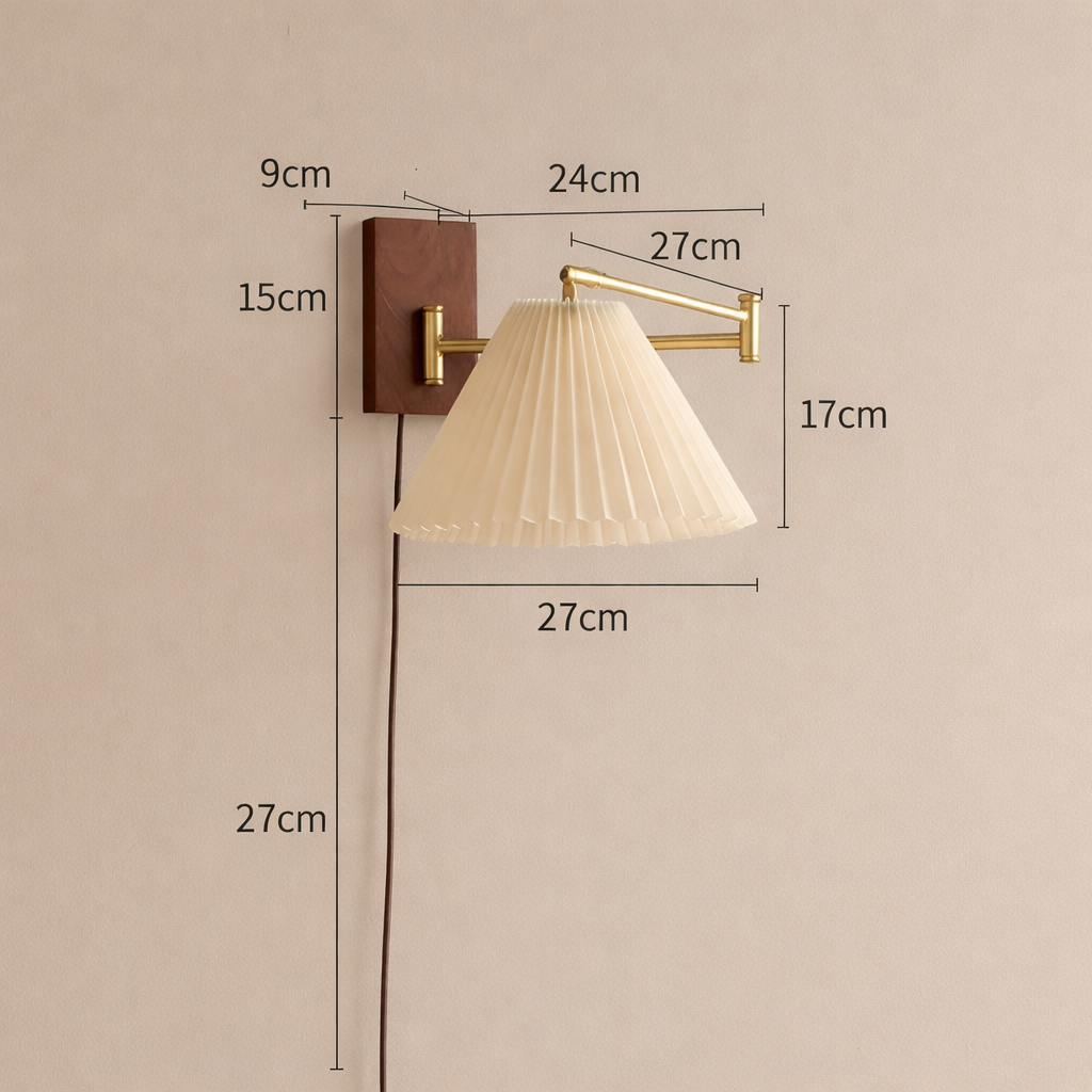 Plug-In fabric wall mounted lamp with Brass swing arm.