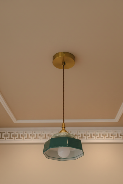 Hand painted Ceramic terracotta pendant light Hanging on a modern ceiling 